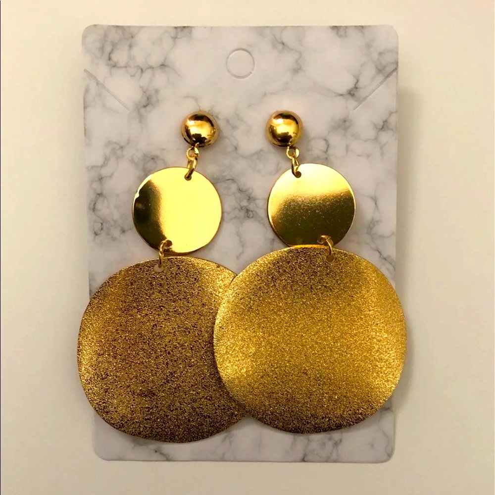 Gold colored dangling earrings